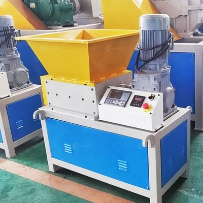 Mini-machine de déchiquetage de bouteilles en plastique pour déchiquetage à double arbre pour une efficacité de recyclage