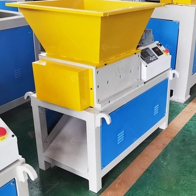 Mini-machine de déchiquetage de bouteilles en plastique pour déchiquetage à double arbre pour une efficacité de recyclage