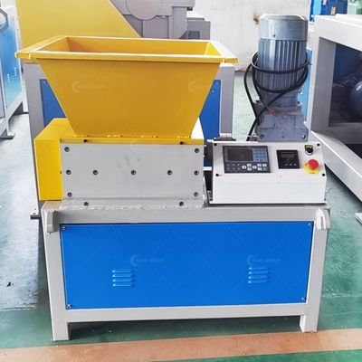 Mini-machine de déchiquetage de bouteilles en plastique pour déchiquetage à double arbre pour une efficacité de recyclage